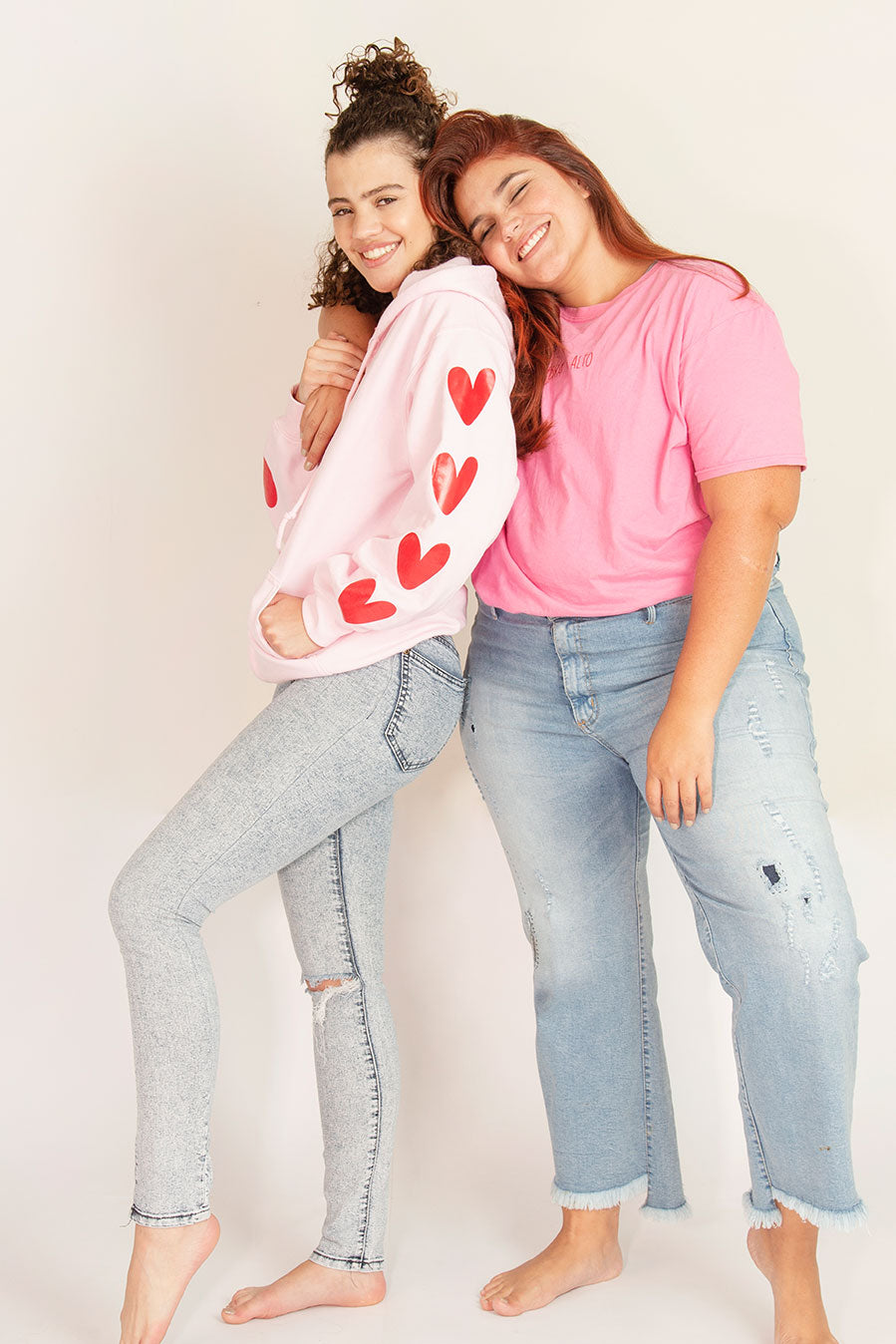 Buzo rosa corazones