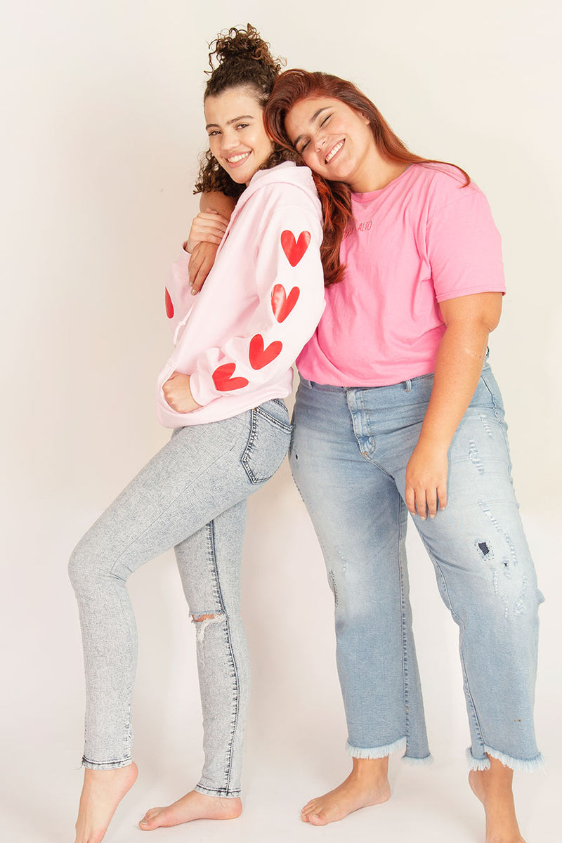 Buzo rosa corazones