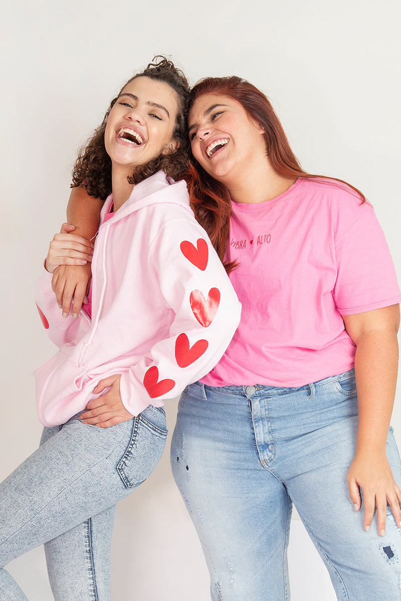 Buzo rosa corazones